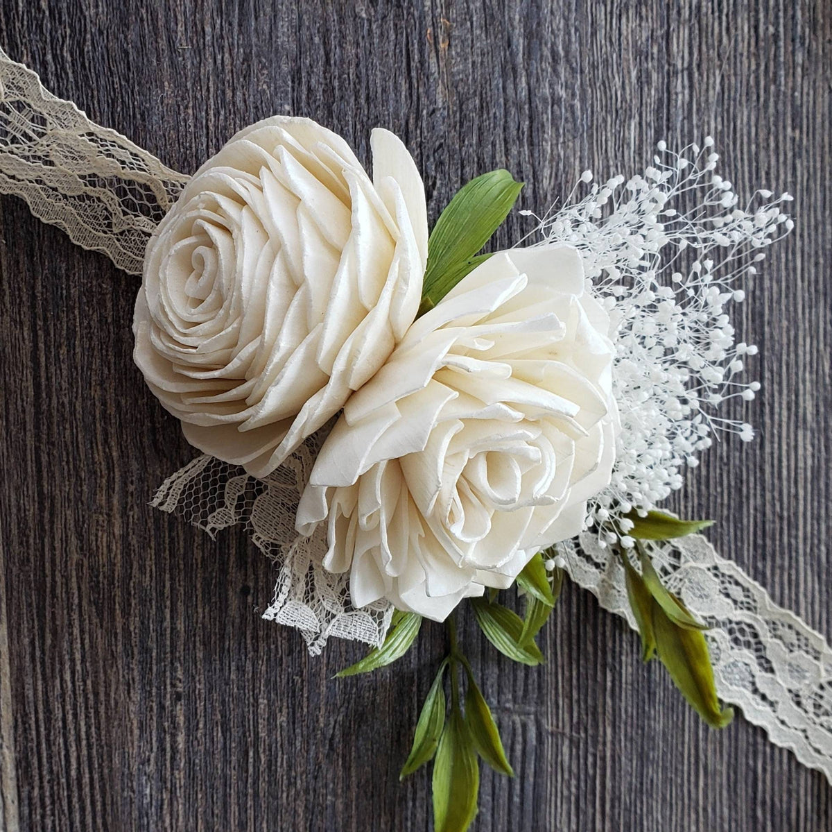 Custom glittered and painted wood flowers bouquets, shops crowns, corsages, and boutonnières. Individually hand glittered sola wood flowers.