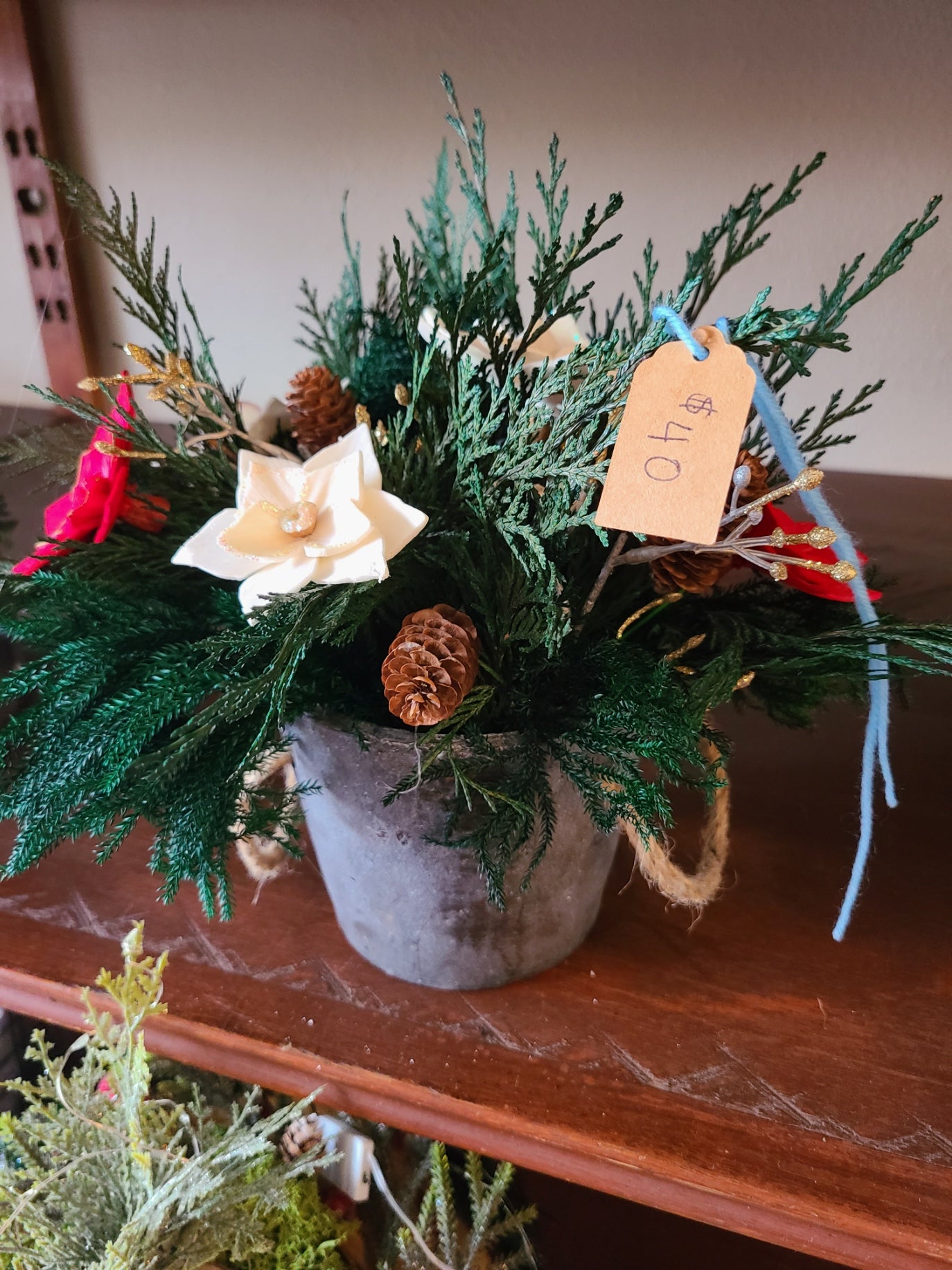 Poinsettia and Pine Cement Planter