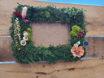 Wooden moss covered picture frame