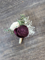 Plum and ivory boutonniere